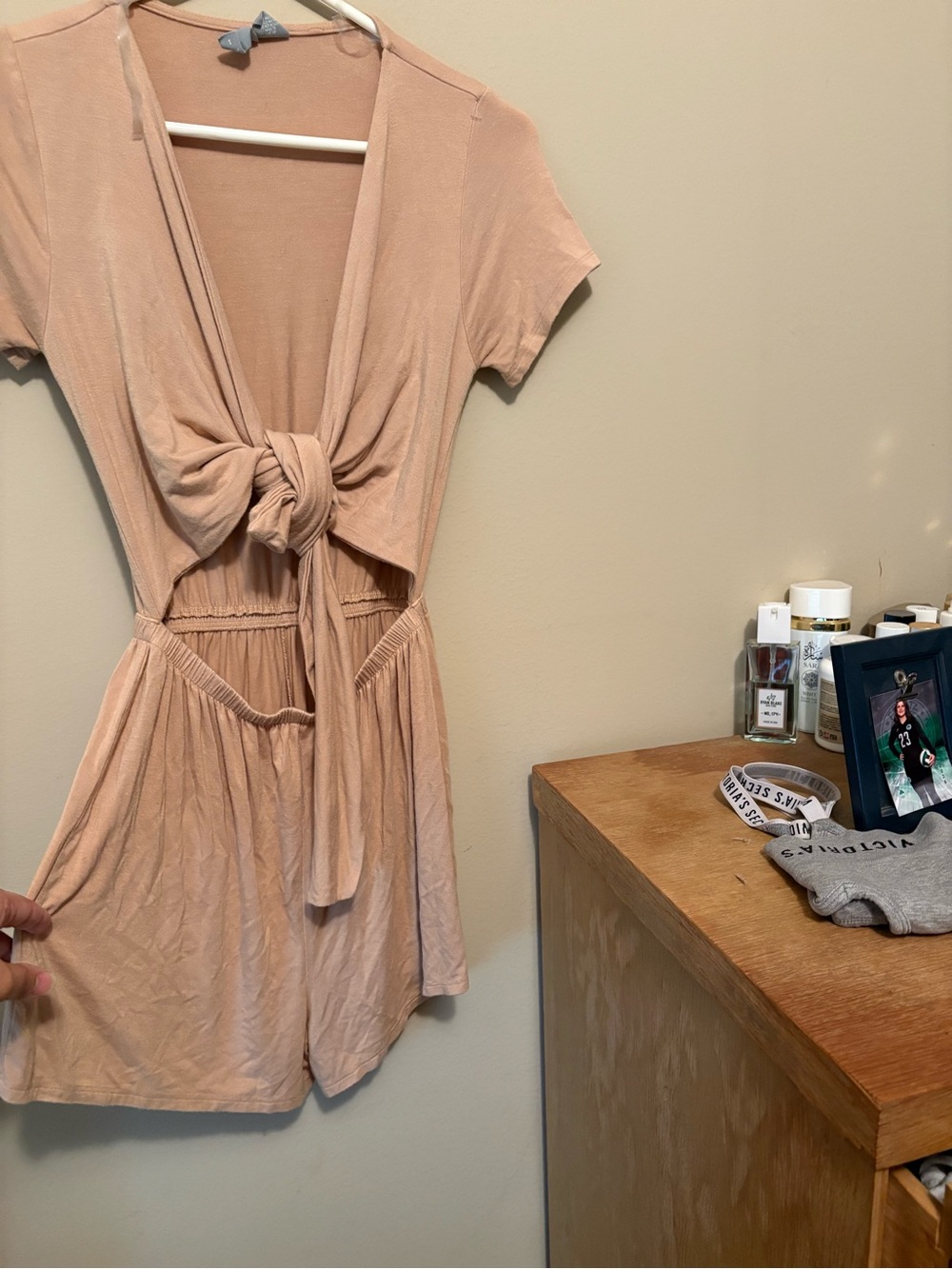 Knot Front Short Sleeve Romper in a beige color